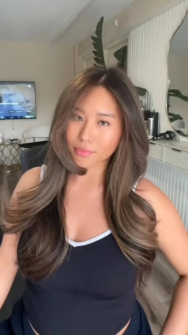 Soft brunette balayage with curtain layers